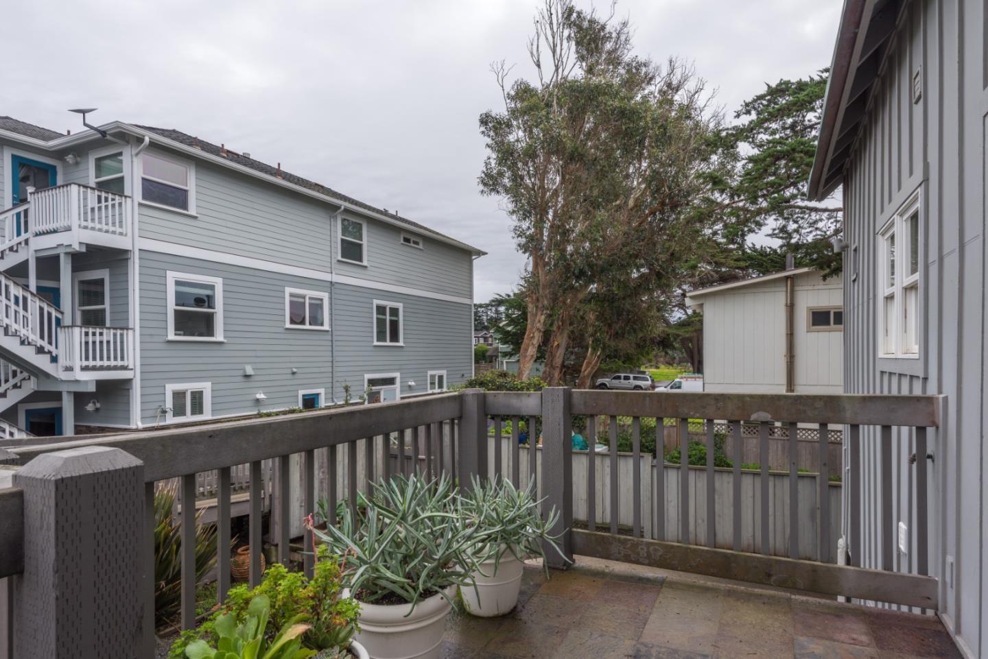 215 Mirada Road Half Moon Bay, CA 94019 - Photo 35 of 47 a front view of a house with a garden