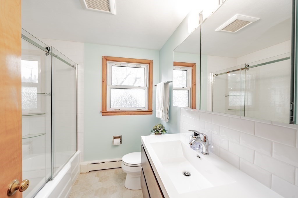 2495 Wilbraham Road Springfield, MA 01129 - Photo 26 of 42 a bathroom with a sink a toilet and shower