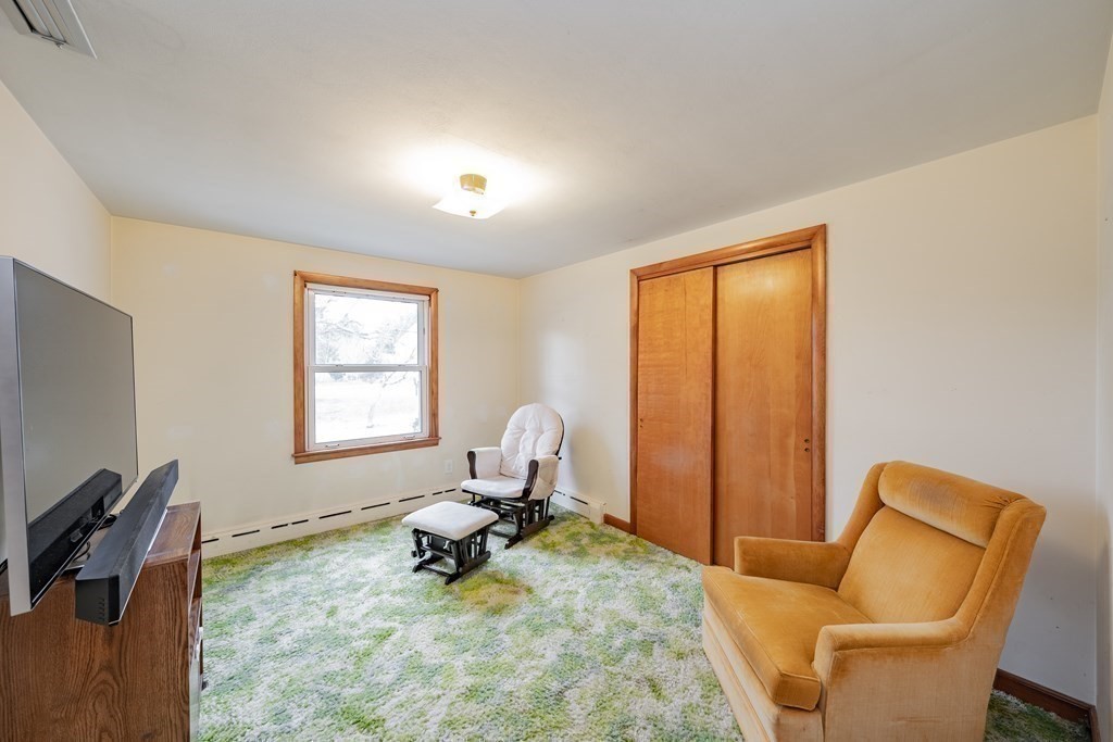 2495 Wilbraham Road Springfield, MA 01129 - Photo 28 of 42 a living room with furniture and a window