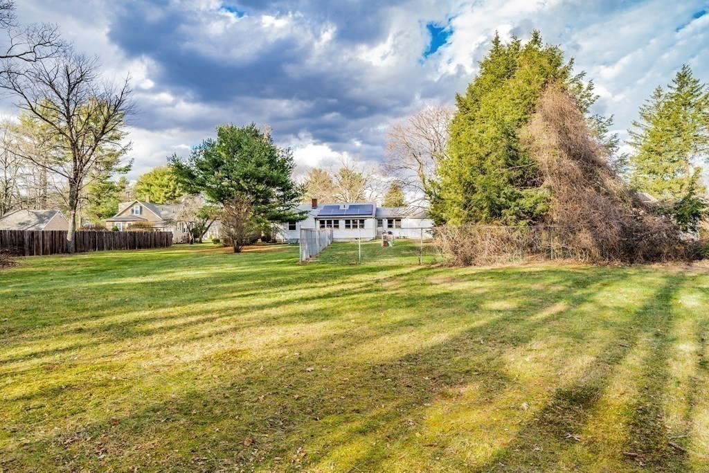 2495 Wilbraham Road Springfield, MA 01129 - Photo 42 of 42 a view of a fountain in front of a big house with a big yard