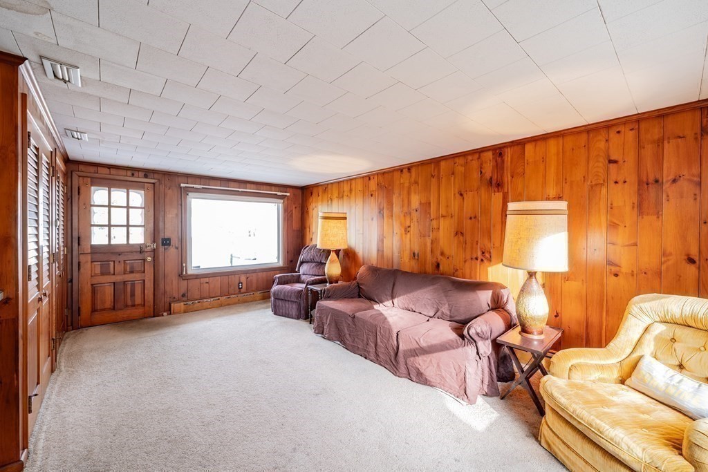 2495 Wilbraham Road Springfield, MA 01129 - Photo 7 of 42 a living room with furniture and a window