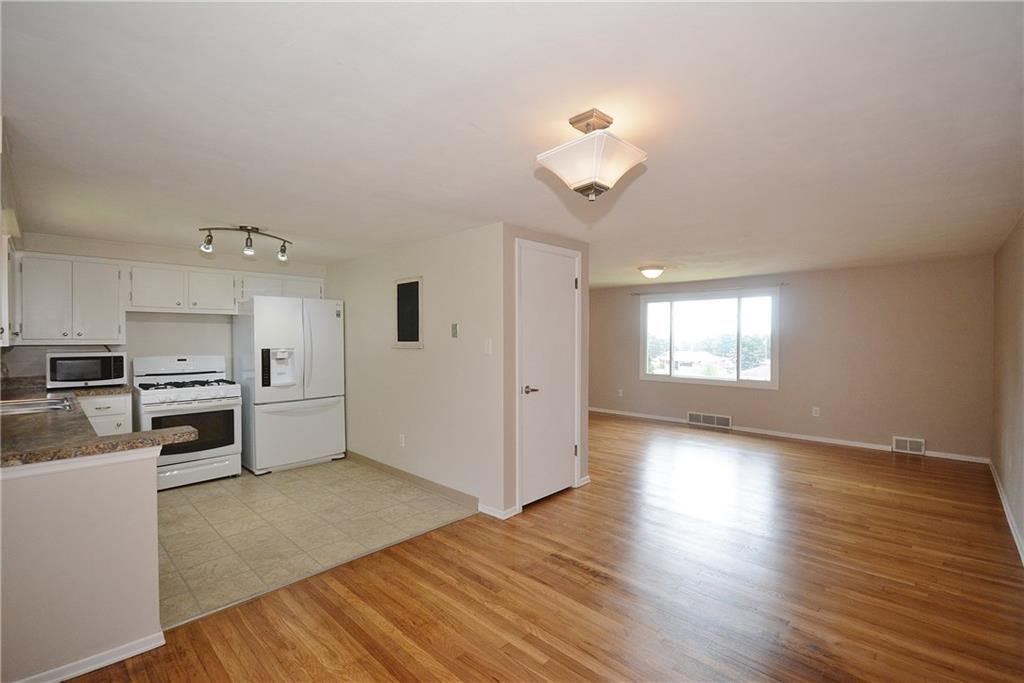 244 Reed Street Lower Burrell, PA 15068 - Photo 8 of 25 Kitchen / Dining Room / Living Room
