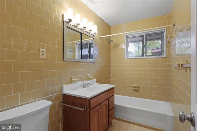 a bathroom with a sink and a bathtub