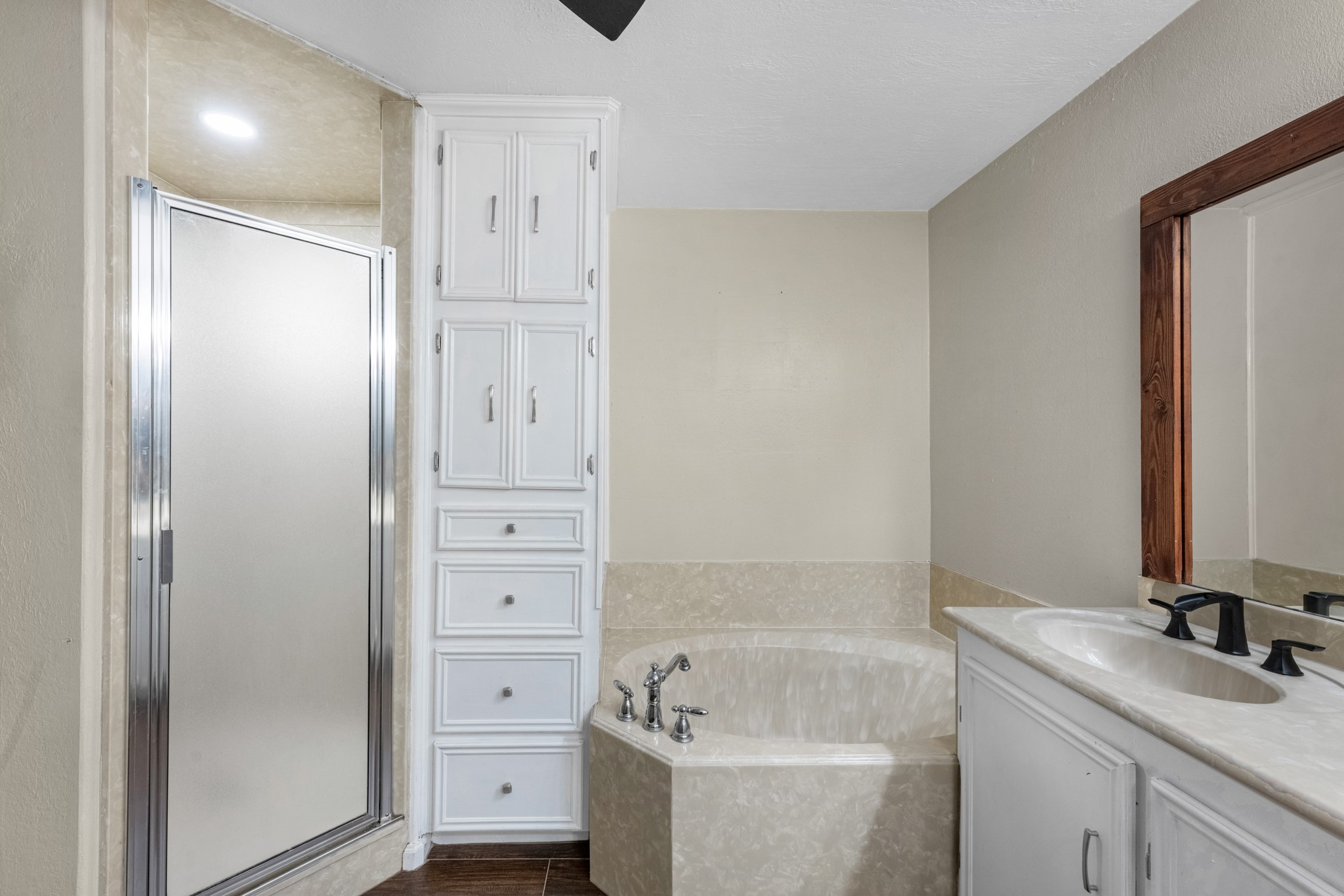 22698 Brook Forest Road New Caney, TX 77357 - Photo 20 of 46 Primary bath features a separate shower, soaking tub and excellent built-in storage.