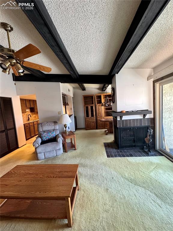 1034 Fontmore Road, Unit D Colorado Springs, CO 80904 - Photo 8 of 23 a living room with furniture and kitchen view