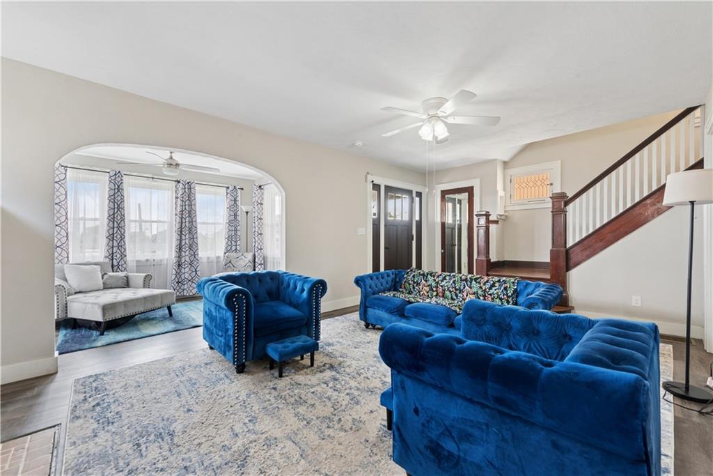 53 Calhoun Avenue Pittsburgh, PA 15210 - Photo 4 of 30 a living room with furniture and a potted plant