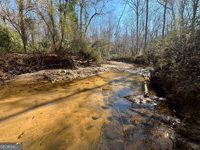 an aerial view of residential house with outdoor space