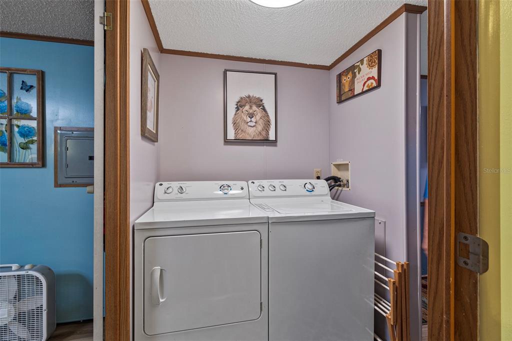 1381 Southeast Lake Road Arcadia, FL 34266 - Photo 14 of 21 a utility room with dryer and washer