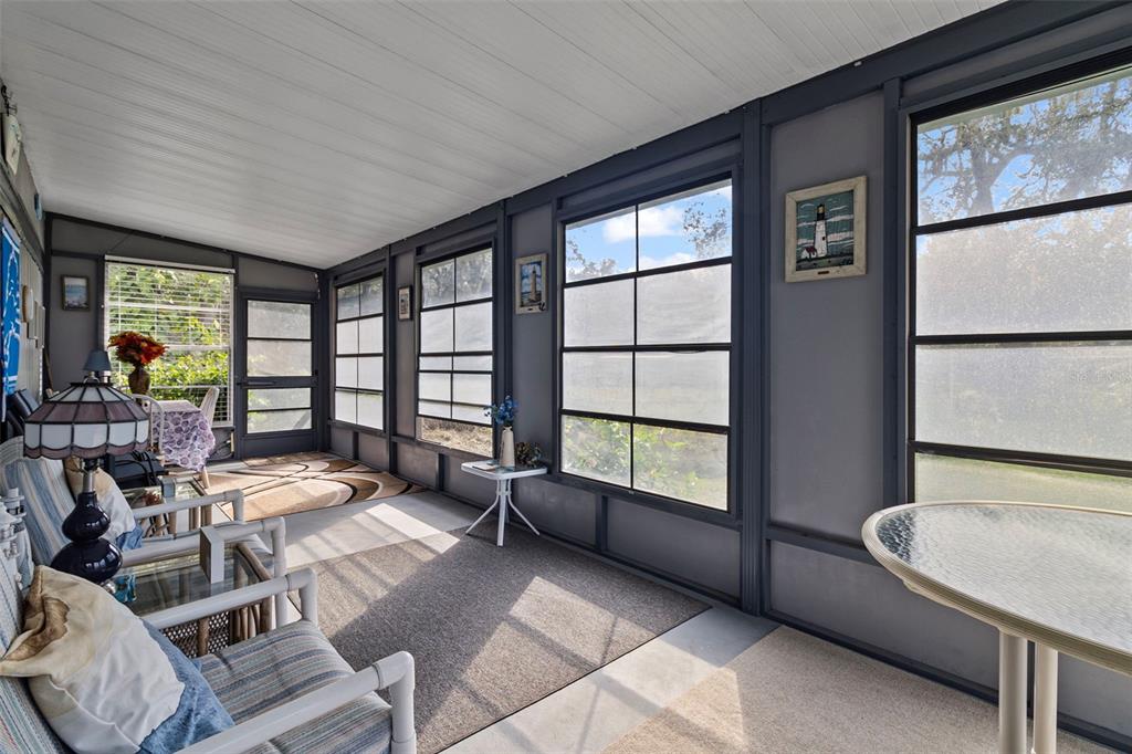 1381 Southeast Lake Road Arcadia, FL 34266 - Photo 18 of 21 a living room with furniture and a large window