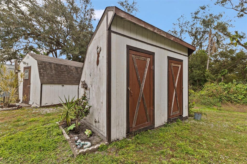 1381 Southeast Lake Road Arcadia, FL 34266 - Photo 21 of 21 a front view of a house with garden