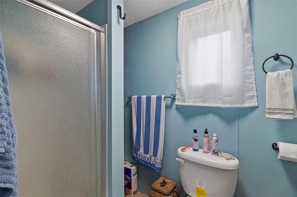 1381 Southeast Lake Road Arcadia, FL 34266 - Photo 8 of 21 a bathroom with a sink toilet and shower