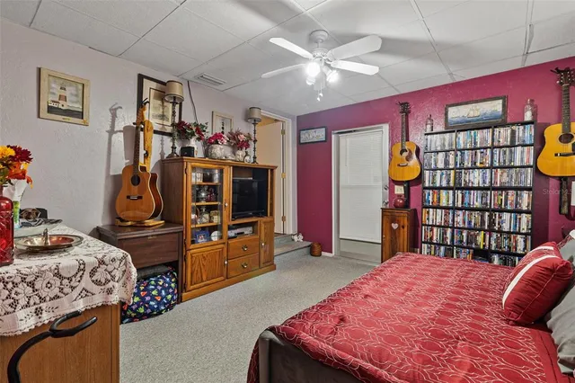 a bedroom with a bed and a walk in closet