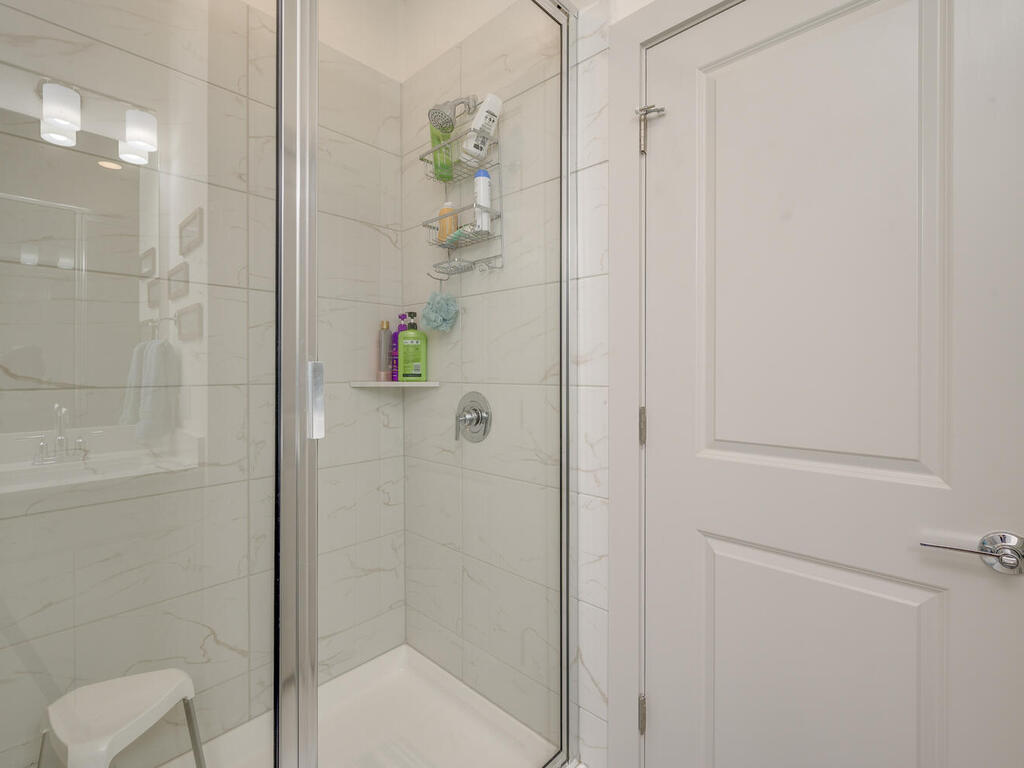 2257 Local Rebel Loop Leander, TX 78641 - Photo 18 of 26 a bathroom with a shower