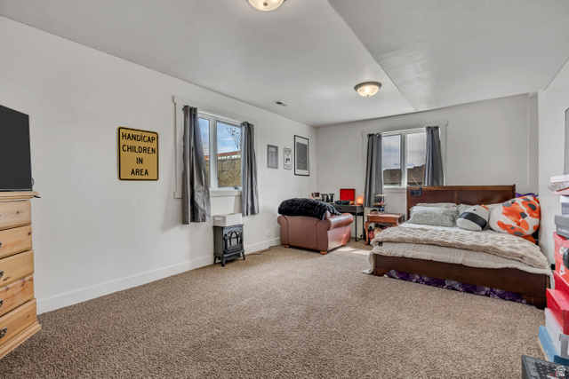 3054 West Ridgeline Road Stockton, UT 84071 - Photo 51 of 88 Carpeted bedroom with baseboards