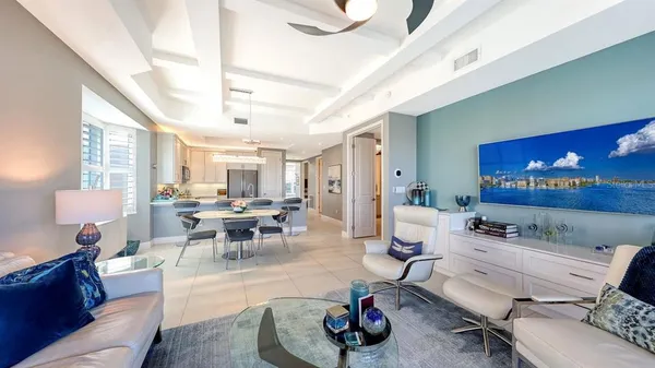 a kitchen with stainless steel appliances a refrigerator sink and microwave