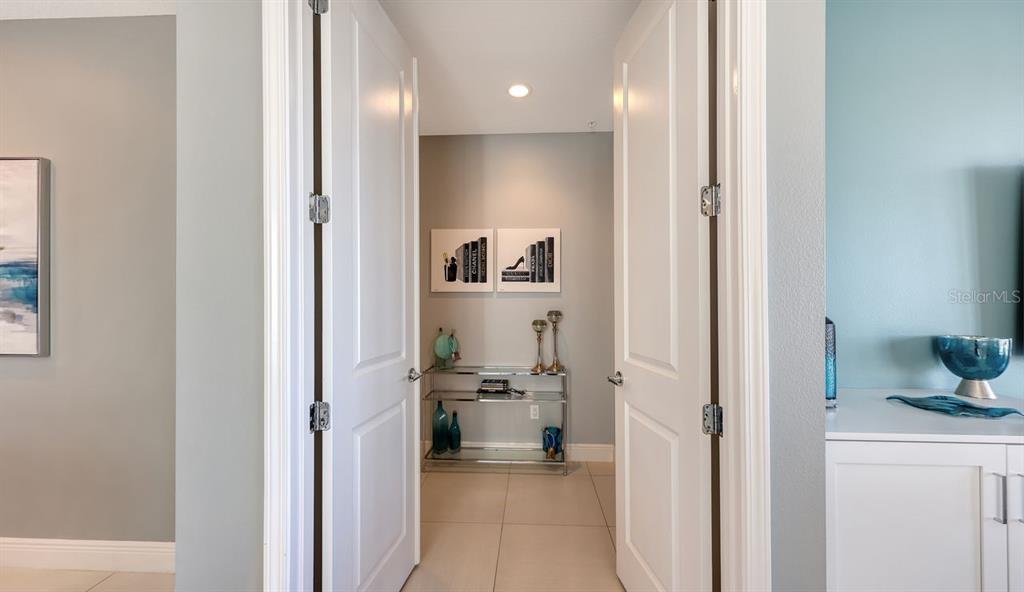 10530 Boardwalk Loop, Unit 505 Lakewood Ranch, FL 34202 - Photo 19 of 67 a bathroom with a sink and a mirror