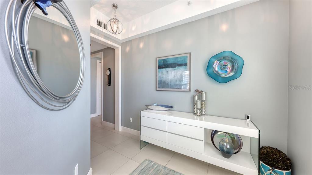 10530 Boardwalk Loop, Unit 505 Lakewood Ranch, FL 34202 - Photo 6 of 67 a bathroom with a sink and a mirror