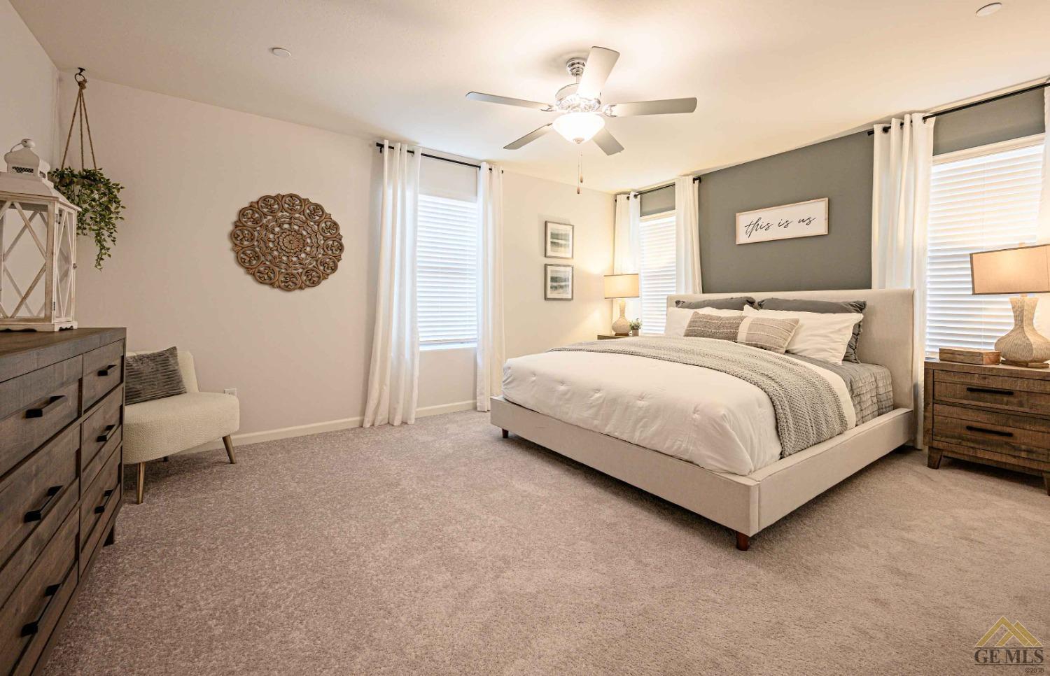 Undisclosed Address Bakersfield, CA 93313 - Photo 5 of 11 a bedroom with a bed and a window