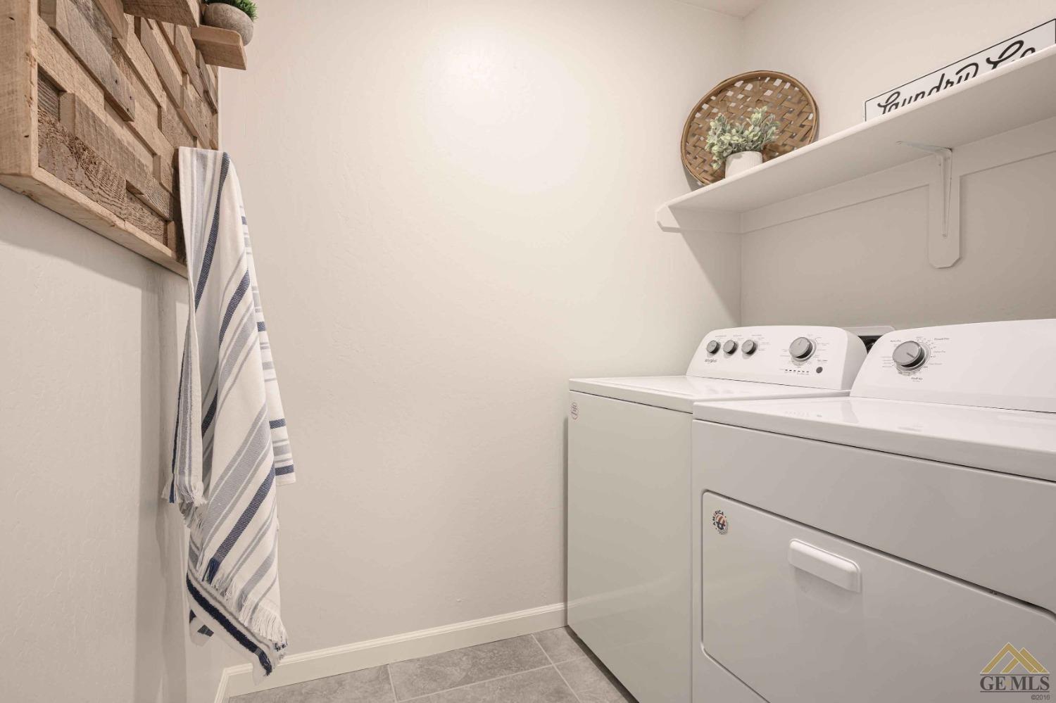 Undisclosed Address Bakersfield, CA 93313 - Photo 9 of 11 a utility room with dryer and washer