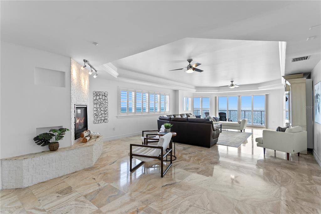 19730 Gulf Boulevard, Unit 400 Indian Rocks Beach, FL 33785 - Photo 6 of 90 a living room with furniture and a potted plant