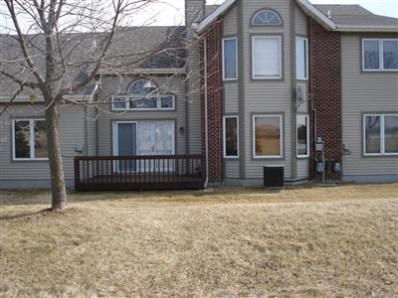 9344 Van Buren Street Crown Point, IN 46307 - Photo 2 of 10 a view of a brick house with many windows