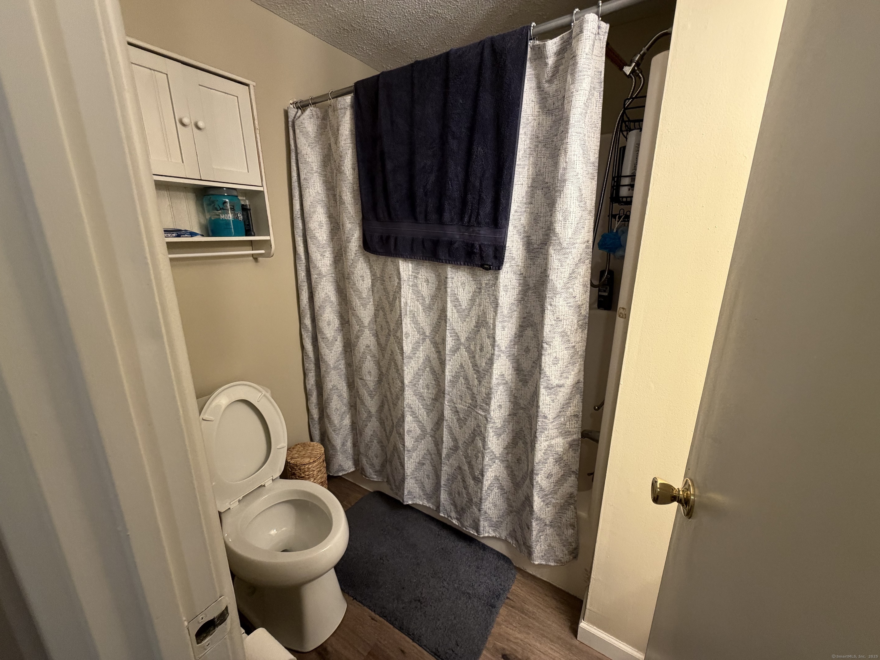 280 Burgundy Hill Lane, Unit 280 Middletown, CT 06457 - Photo 8 of 9 a bathroom with a sink toilet and shower