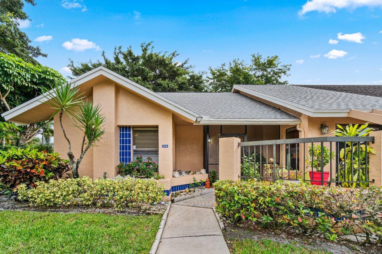 10948 Hidden Lake Place Boca Raton, FL 33498 - Photo 1 of 38 Front