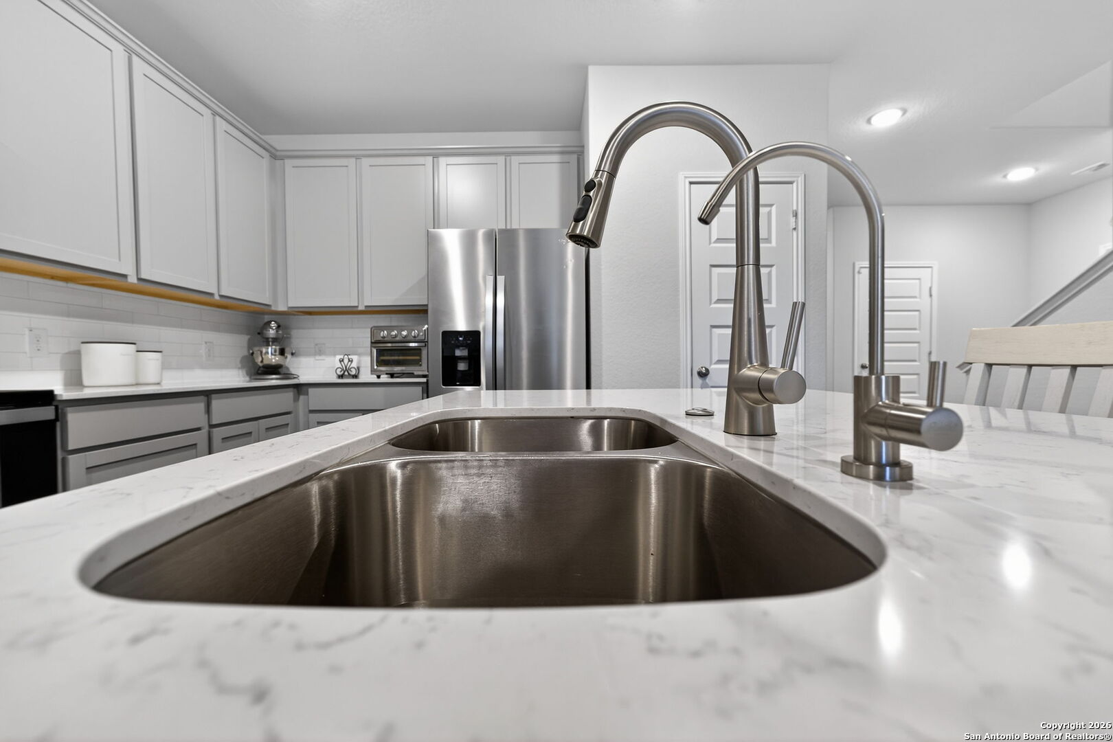 132 Bella Rosa Trail Cibolo, TX 78108 - Photo 21 of 49 a view of a sink a counter top space in a kitchen