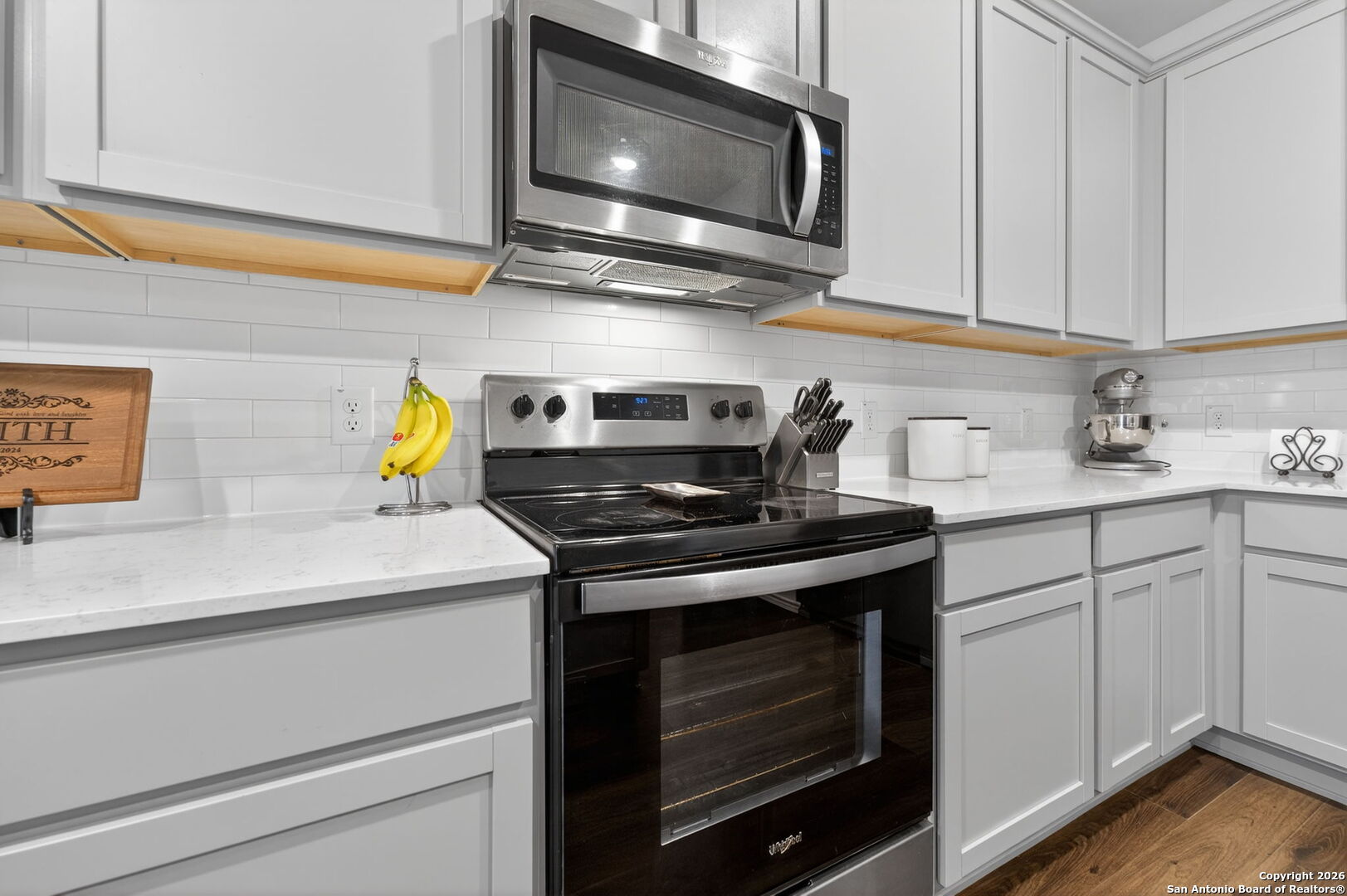 132 Bella Rosa Trail Cibolo, TX 78108 - Photo 22 of 49 a kitchen with a stove and a microwave
