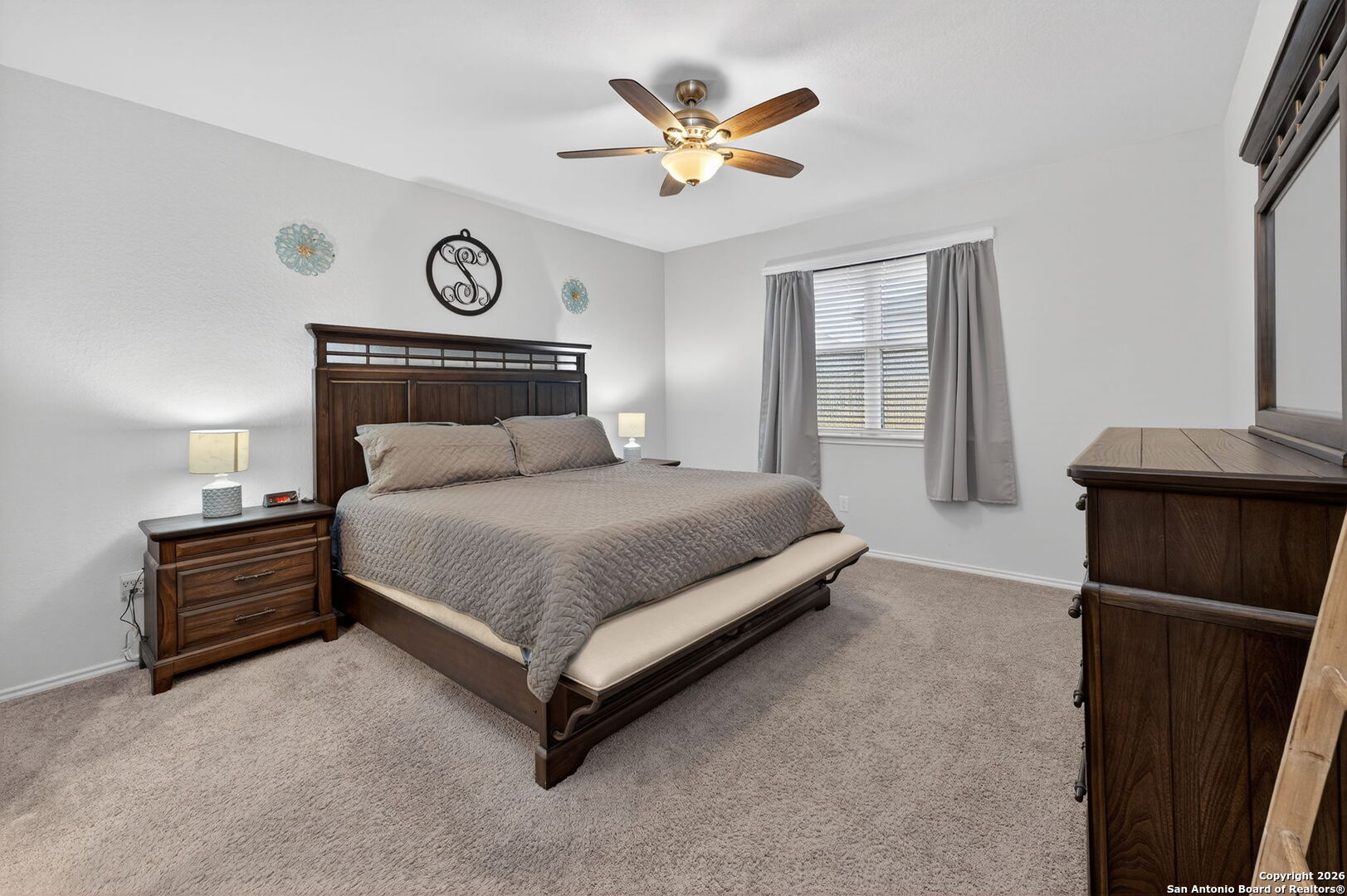 132 Bella Rosa Trail Cibolo, TX 78108 - Photo 26 of 49 a bedroom with a bed and window
