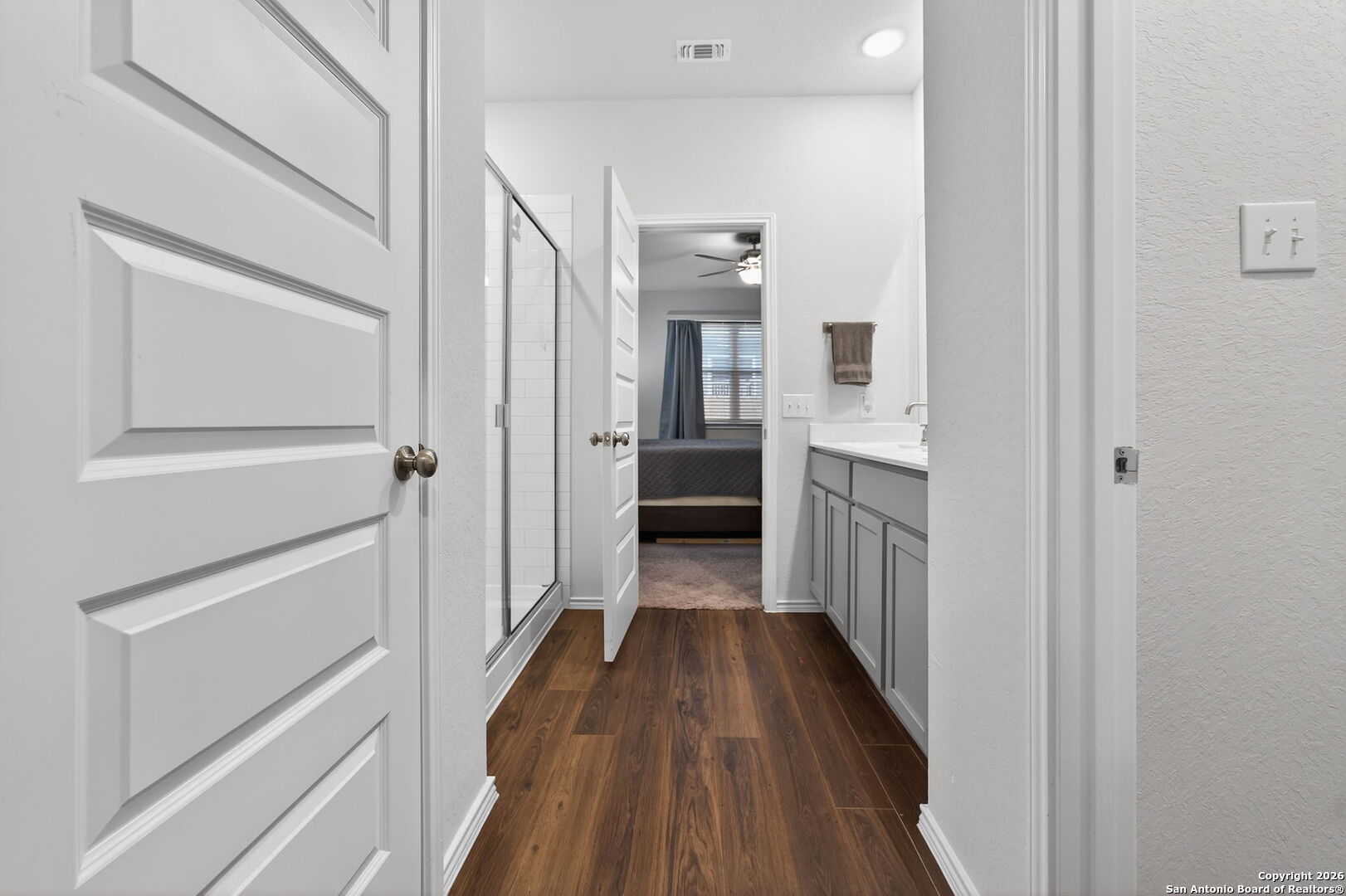 132 Bella Rosa Trail Cibolo, TX 78108 - Photo 29 of 49 a view of a hallway with a hardwood floor and a hallway