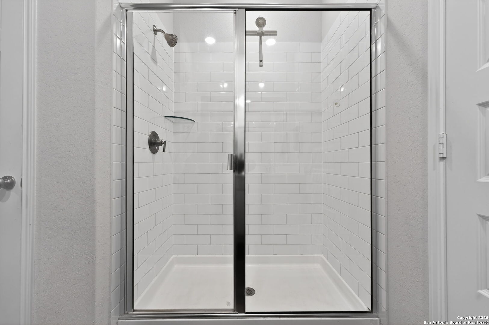 132 Bella Rosa Trail Cibolo, TX 78108 - Photo 32 of 49 a bathroom with a glass shower door