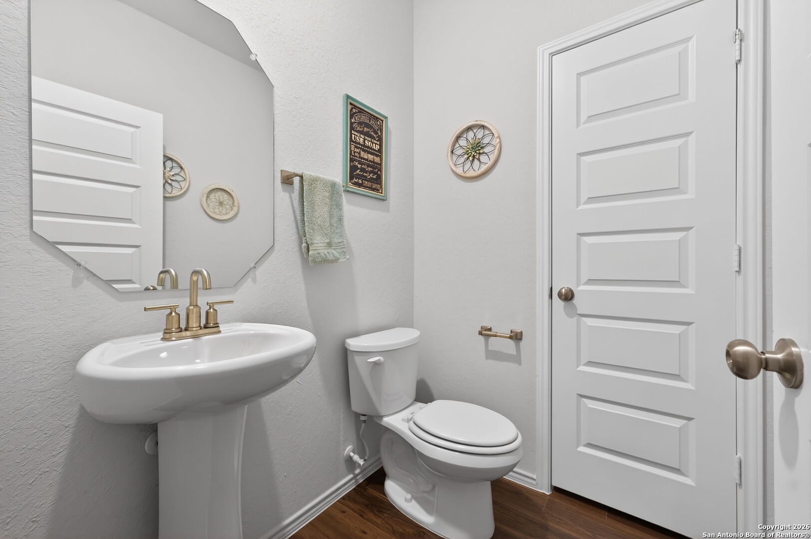132 Bella Rosa Trail Cibolo, TX 78108 - Photo 36 of 49 a bathroom with a toilet sink and mirror