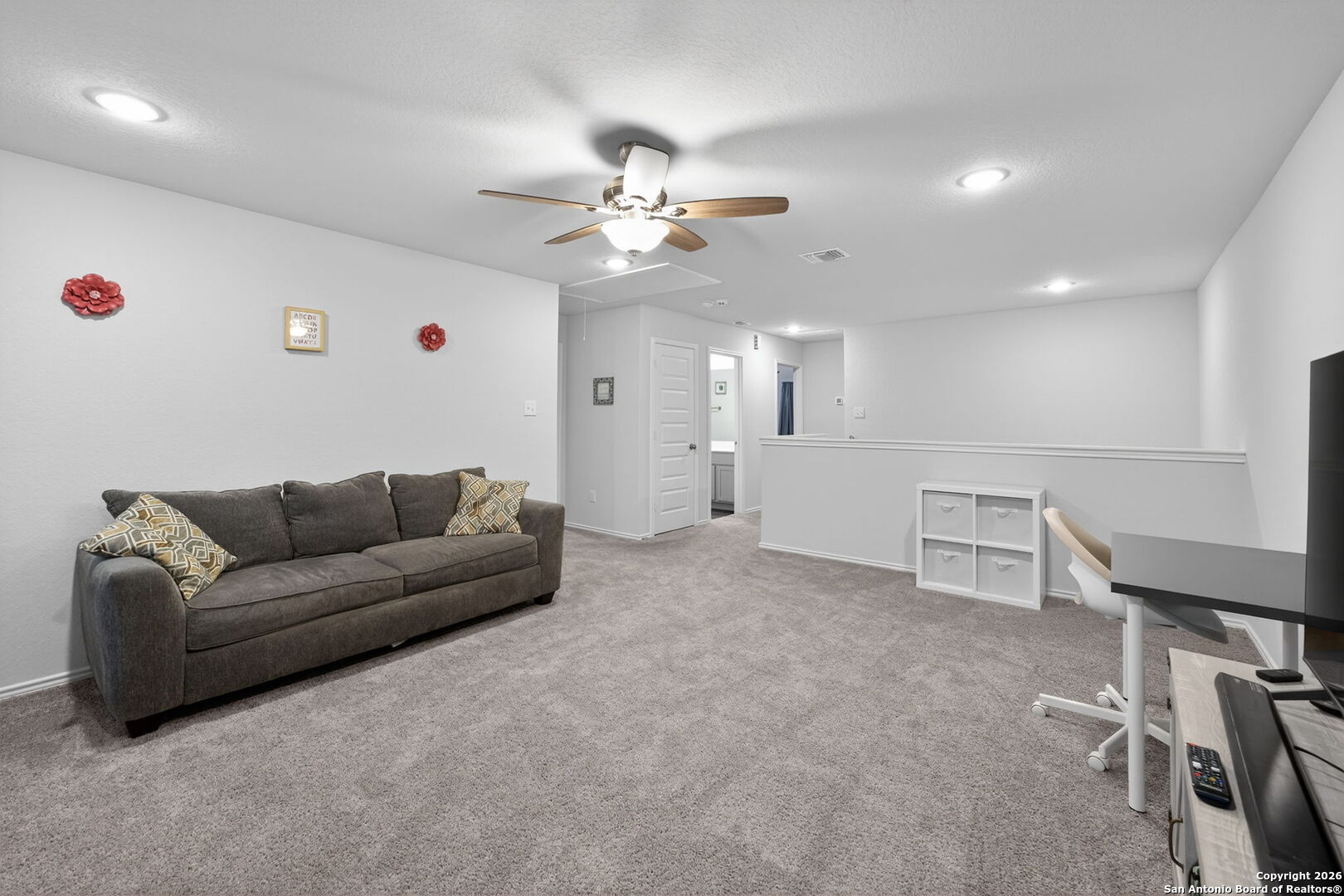 132 Bella Rosa Trail Cibolo, TX 78108 - Photo 38 of 49 a living room with furniture and a ceiling fan