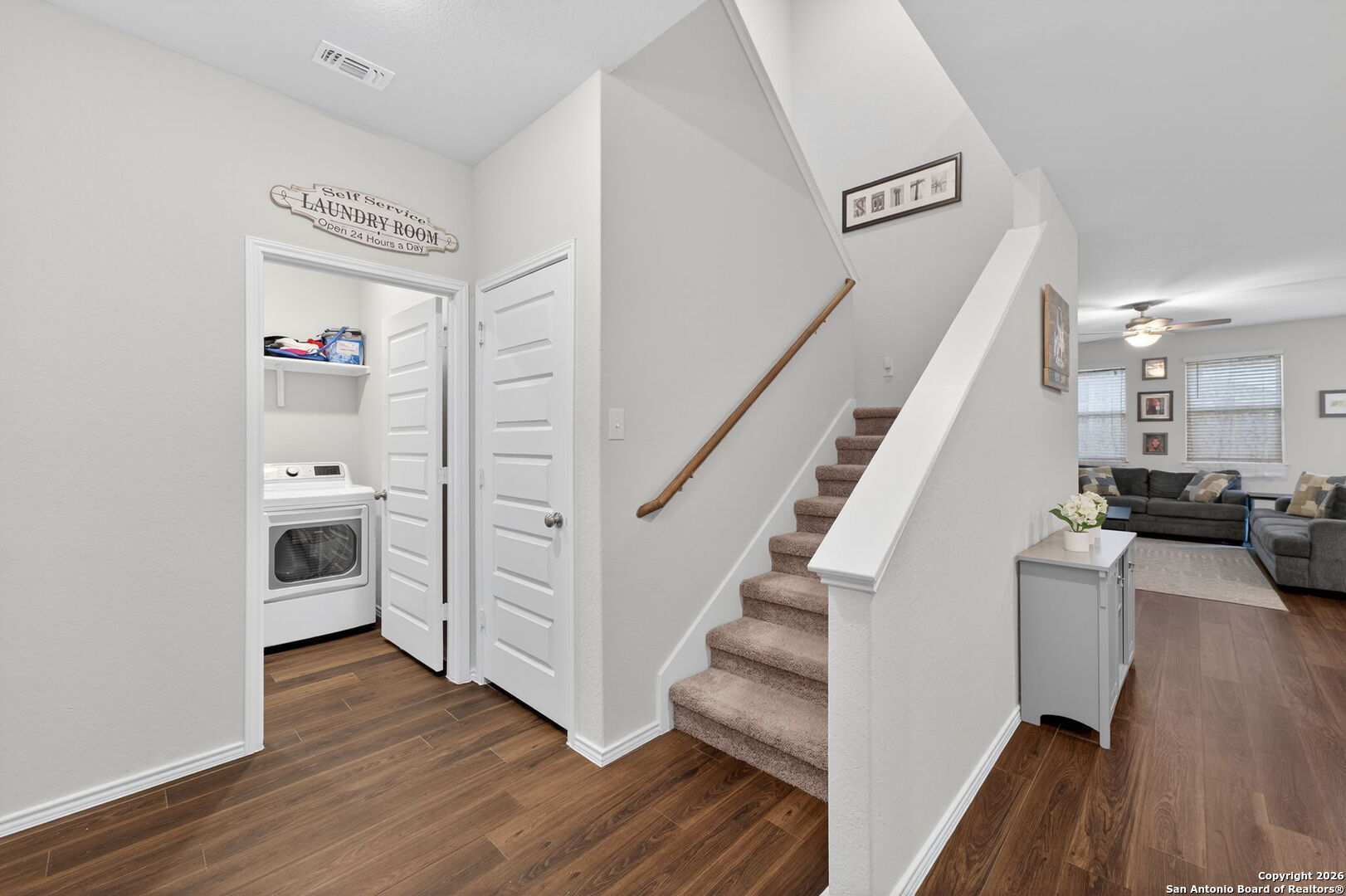 132 Bella Rosa Trail Cibolo, TX 78108 - Photo 8 of 49 a view of entryway and kitchen with wooden floor