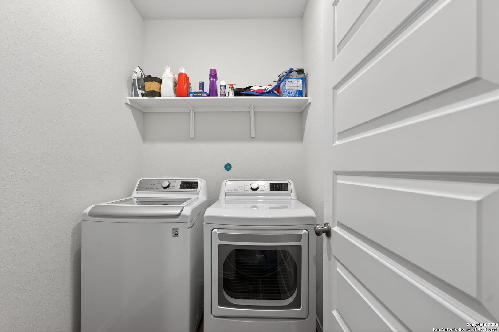 132 Bella Rosa Trail Cibolo, TX 78108 - Photo 9 of 49 a utility room with dryer and washer