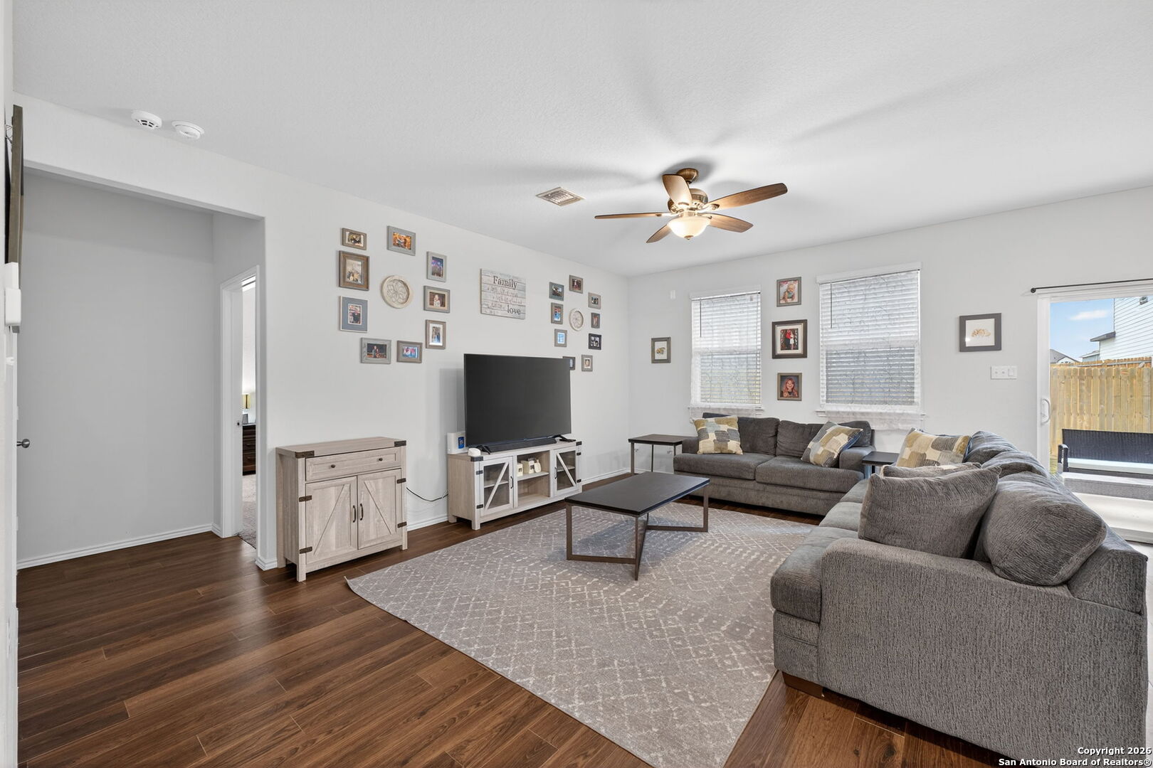132 Bella Rosa Trail Cibolo, TX 78108 - Photo 10 of 49 a living room with furniture and a flat screen tv