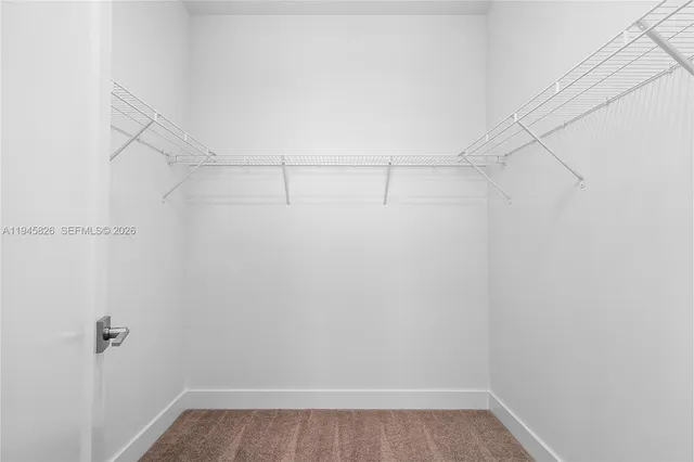 an aerial view of residential houses with swimming pool