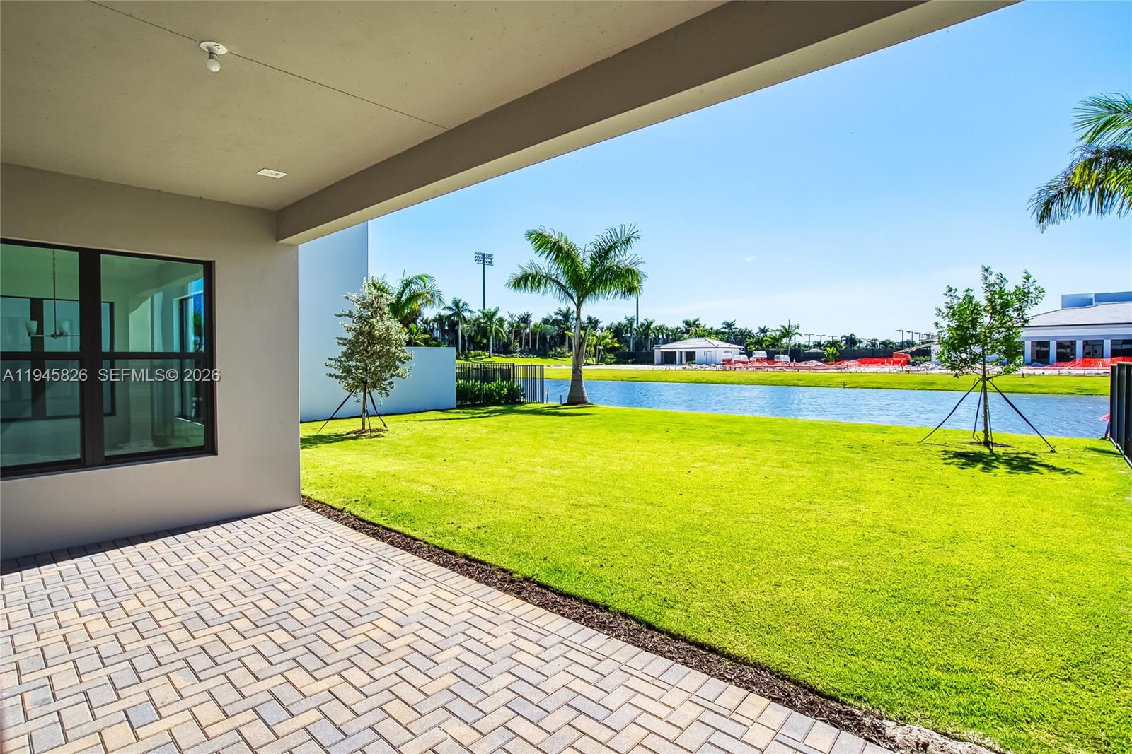 9362 Tulip Leaf Court Boca Raton, FL 33434 - Photo 63 of 80 a swimming pool with an outdoor seating and yard