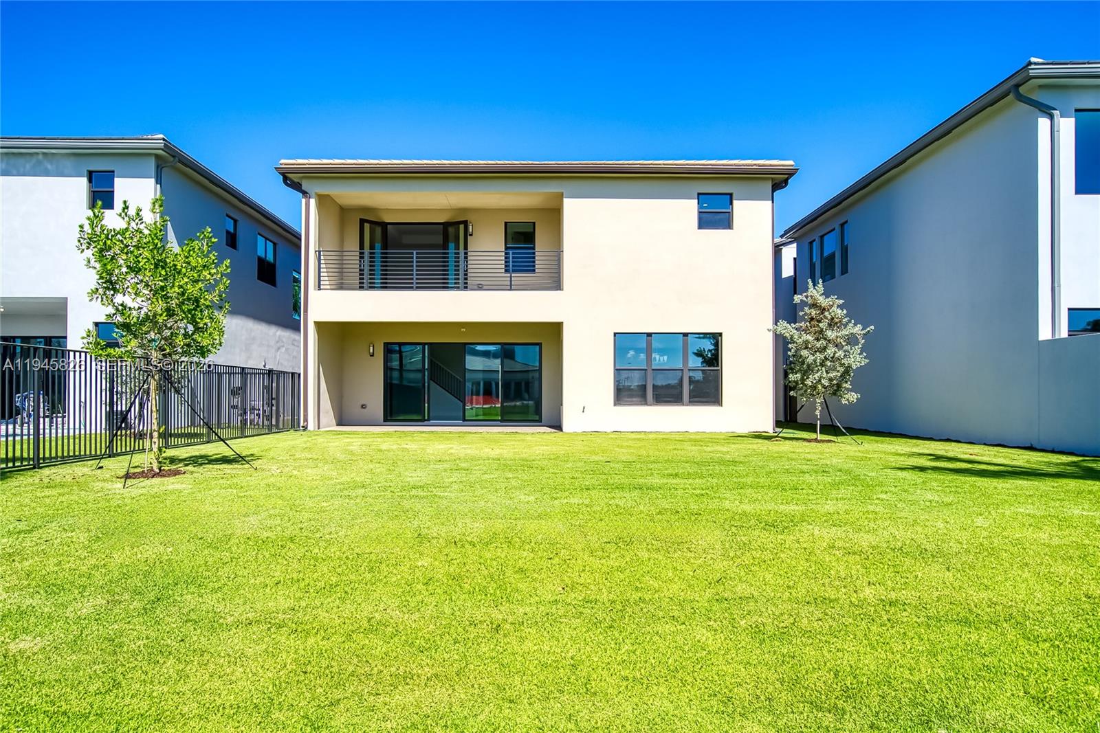 9362 Tulip Leaf Court Boca Raton, FL 33434 - Photo 67 of 80 a front view of a house with a garden