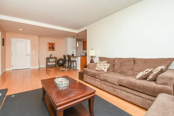 a living room with furniture and a table