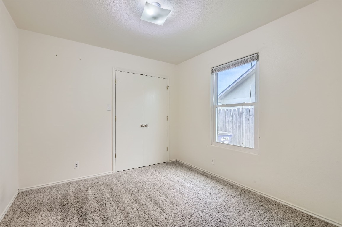 224 Copper Lane Jarrell, TX 76537 - Photo 9 of 11 an empty room with windows