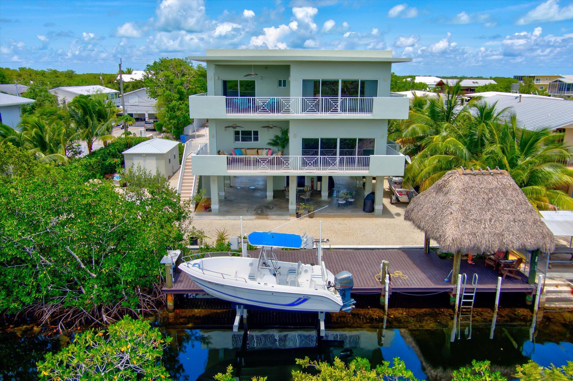 217 La Paloma Road Key Largo, FL 33037 - Photo 1 of 44 Aerial Back of Home