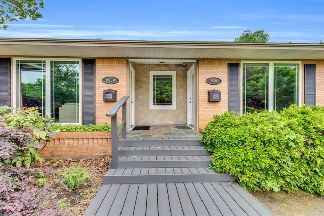 a front view of a house with a porch