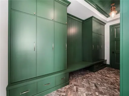 a bathroom with a shower and a sink