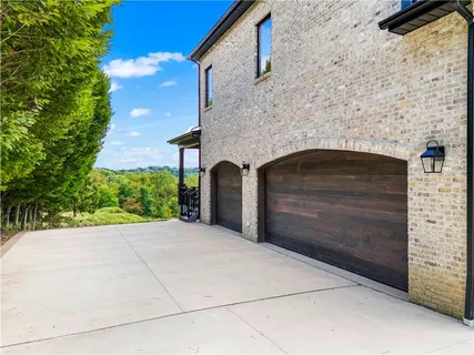 a front view of a house with a garage