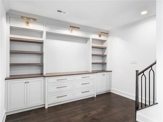 a view of an empty walk in closet