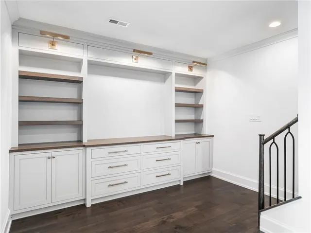 a view of an empty walk in closet