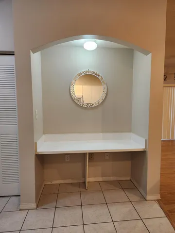 a room with a table and a chair