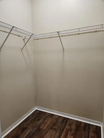 a view of a room with racks on the wall